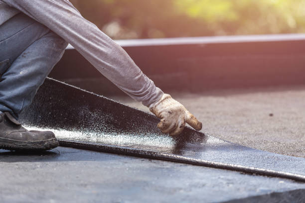 Professional Basement Waterproofing technician working in Benton, IL
